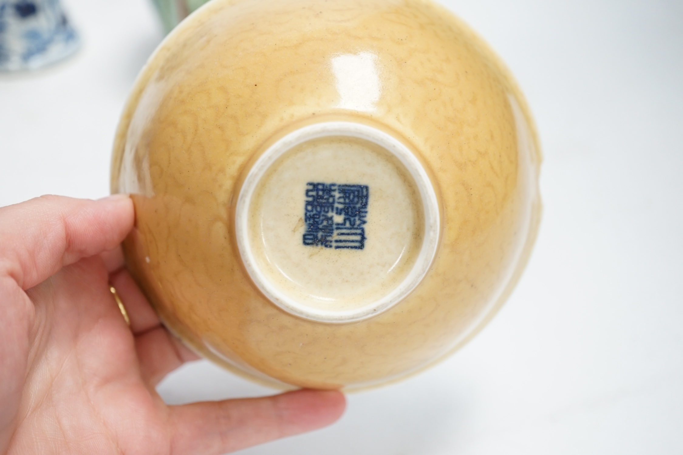 Chinese ceramics to include a crackleware vase and a blue and white vase, a jar and cover and a rice bowl, tallest 20cm high. Condition - all items damaged, overall poor